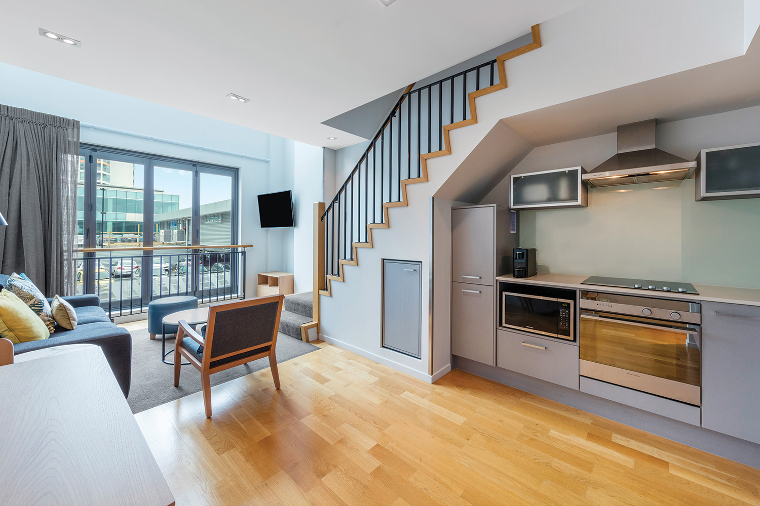 adina apartment hotel auckland two bedroom apartment lounge room kitchen 2017