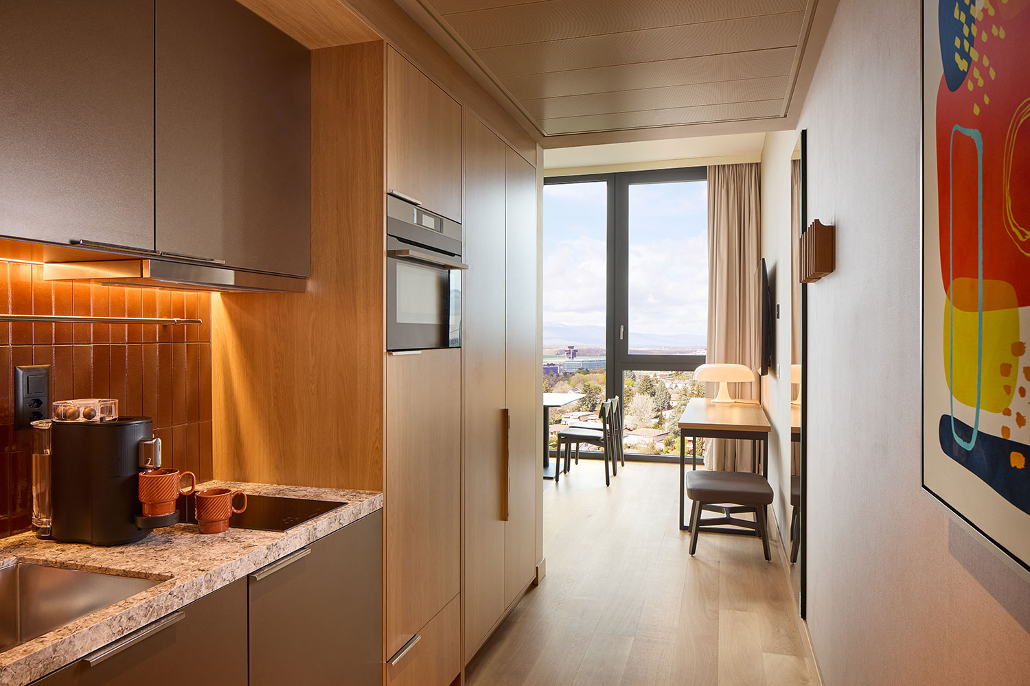 adina geneva_one bedroom kitchen_04 2023