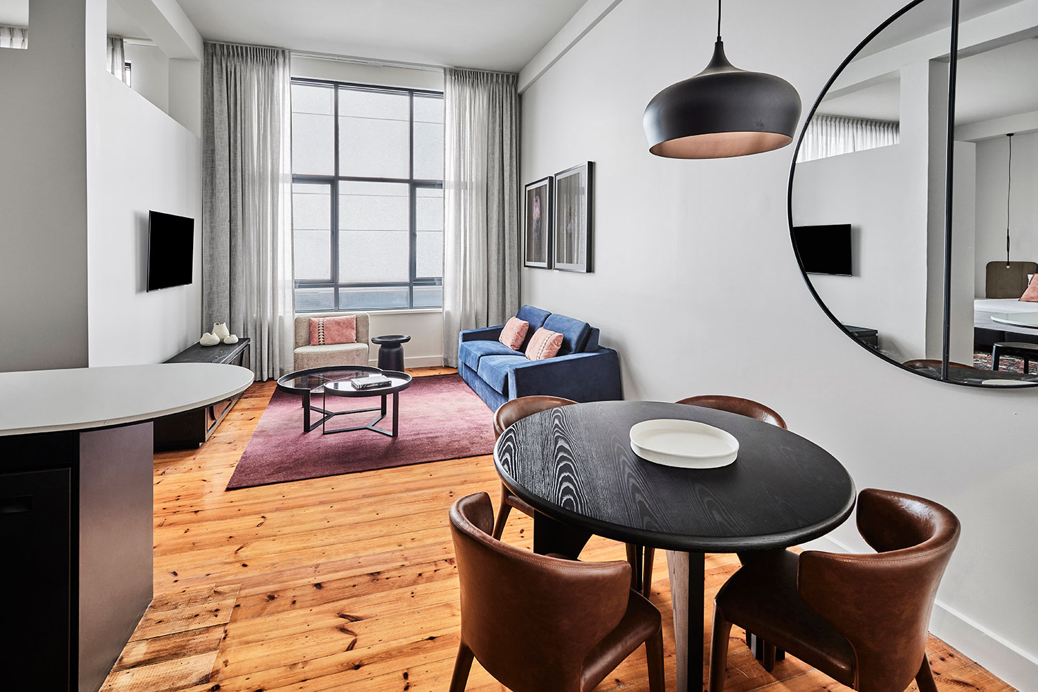 adina melbourne flinders street apartment hotel loft apartment living room 02 2022 hero image