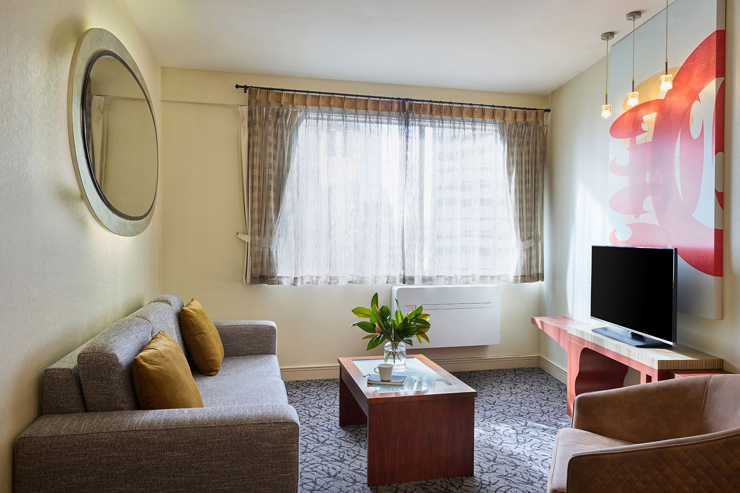 adina citylife wellington 1 bed apartment living room styled 2026