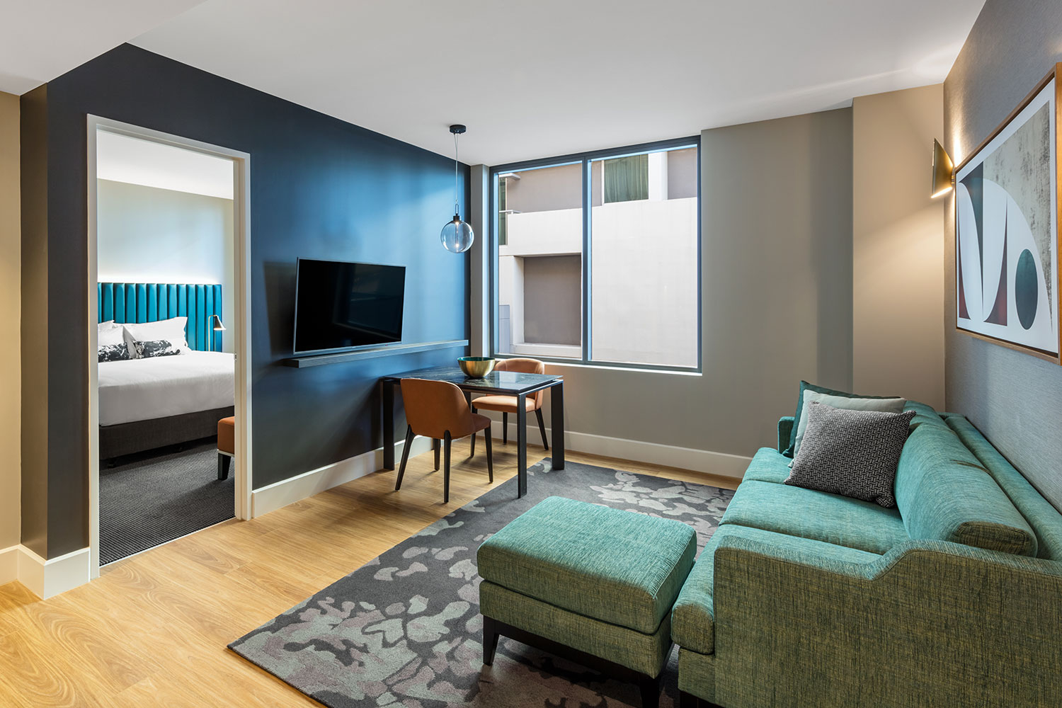 adina apartment hotel brisbane one bedroom premier room lounge room 01 2018