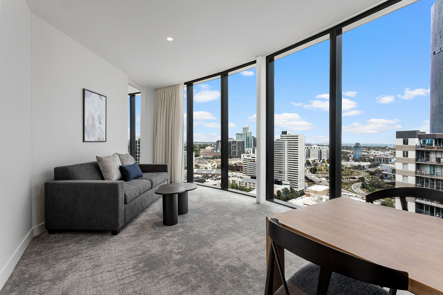 adina apartment hotel melbourne southbank premier one bedroom lounge room 01 2020