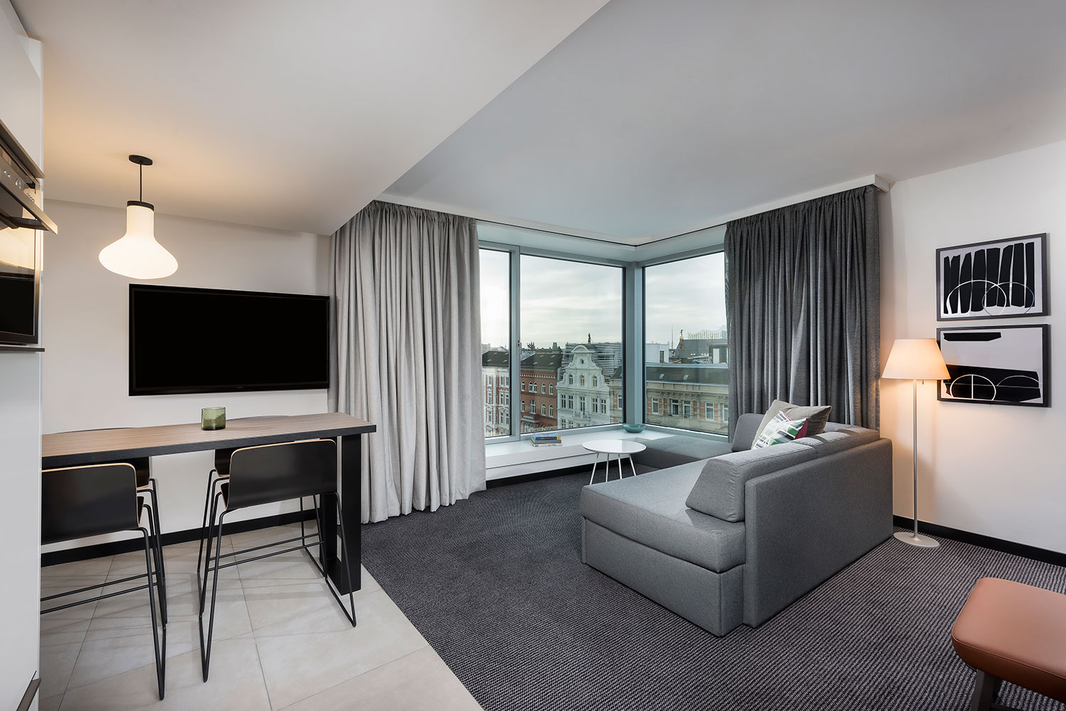adina apartment hotel hamburg speicherstadt one bedroom lounge room 01 2018