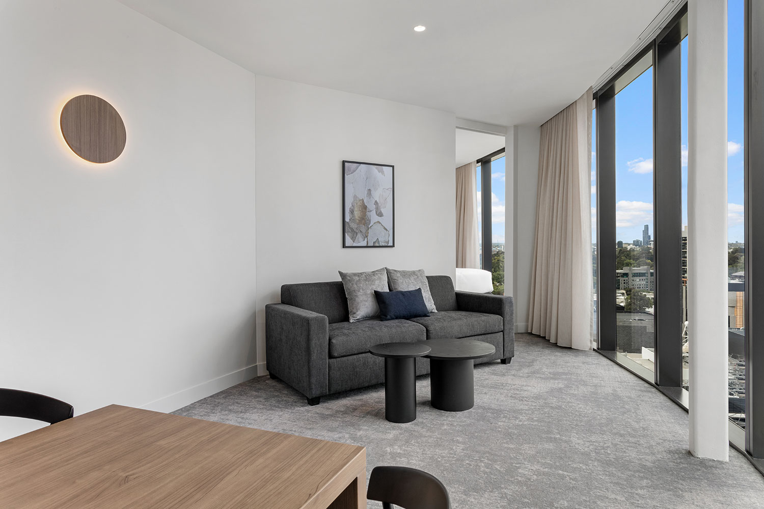 adina apartment hotel melbourne southbank premier one bedroom lounge room 03 2020