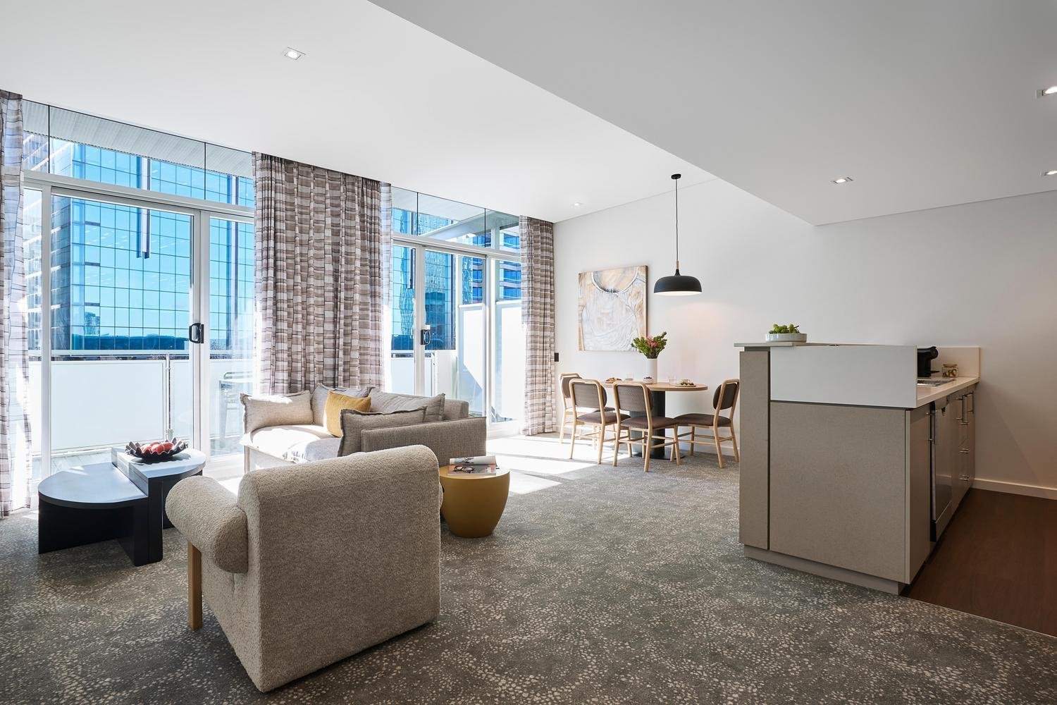 adina perth premier one bedroom apartment lounge room 05 2026