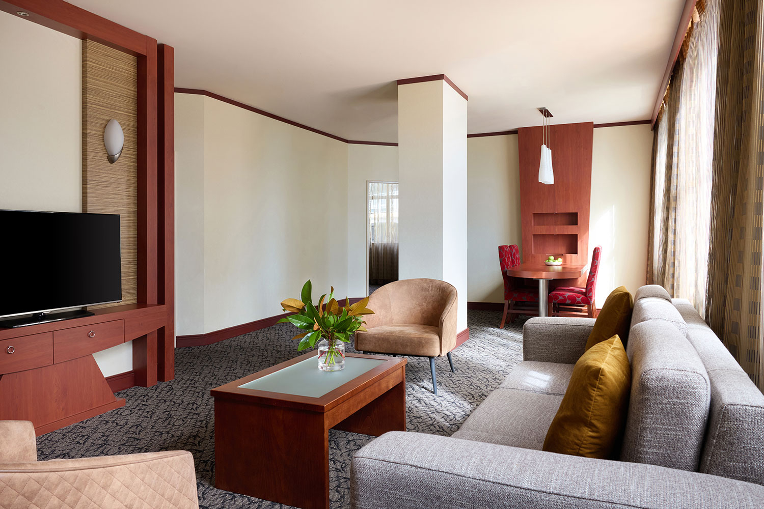 adina citylife wellington 2 bed apartment balcony living room styled 2026 2