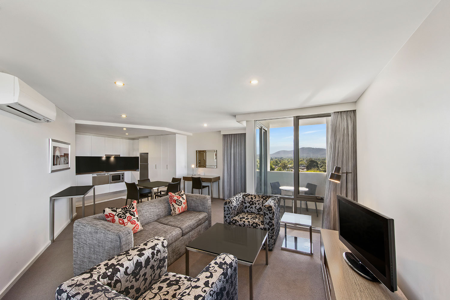 adina serviced apartments canberra dickson premier one bedroom lounge room 01 2018